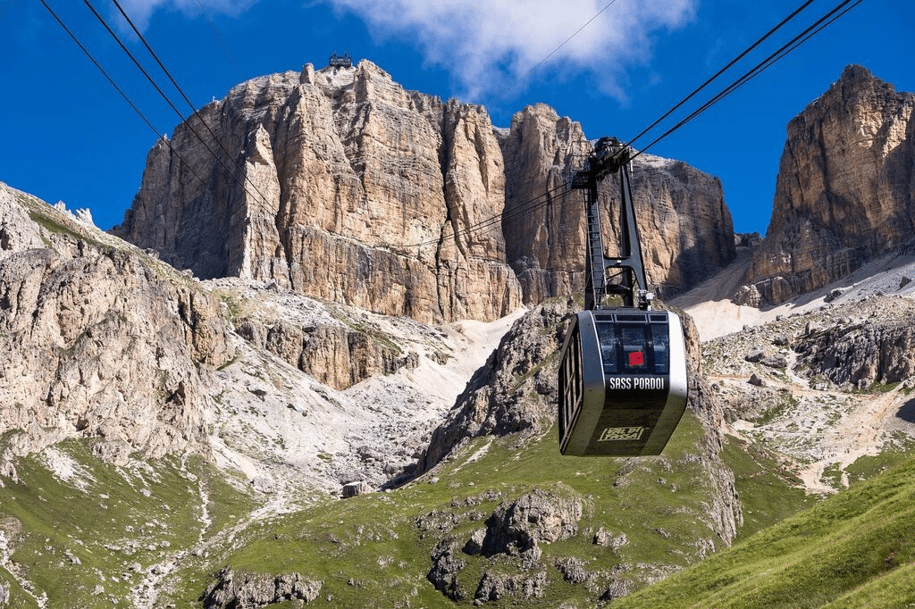 Alba delle dolomiti 2026 al sass pordoi: concerto gratis, funivia, parcheggio e come arrivare